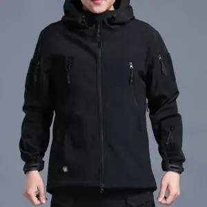 A person wearing a Fleece Autumn Military Men Jackets Waterproof Fishing Hunting Hiking Camping Climbing Winter Tracksuits Coat Thermal Fall S-5XL with multiple zipper pockets.